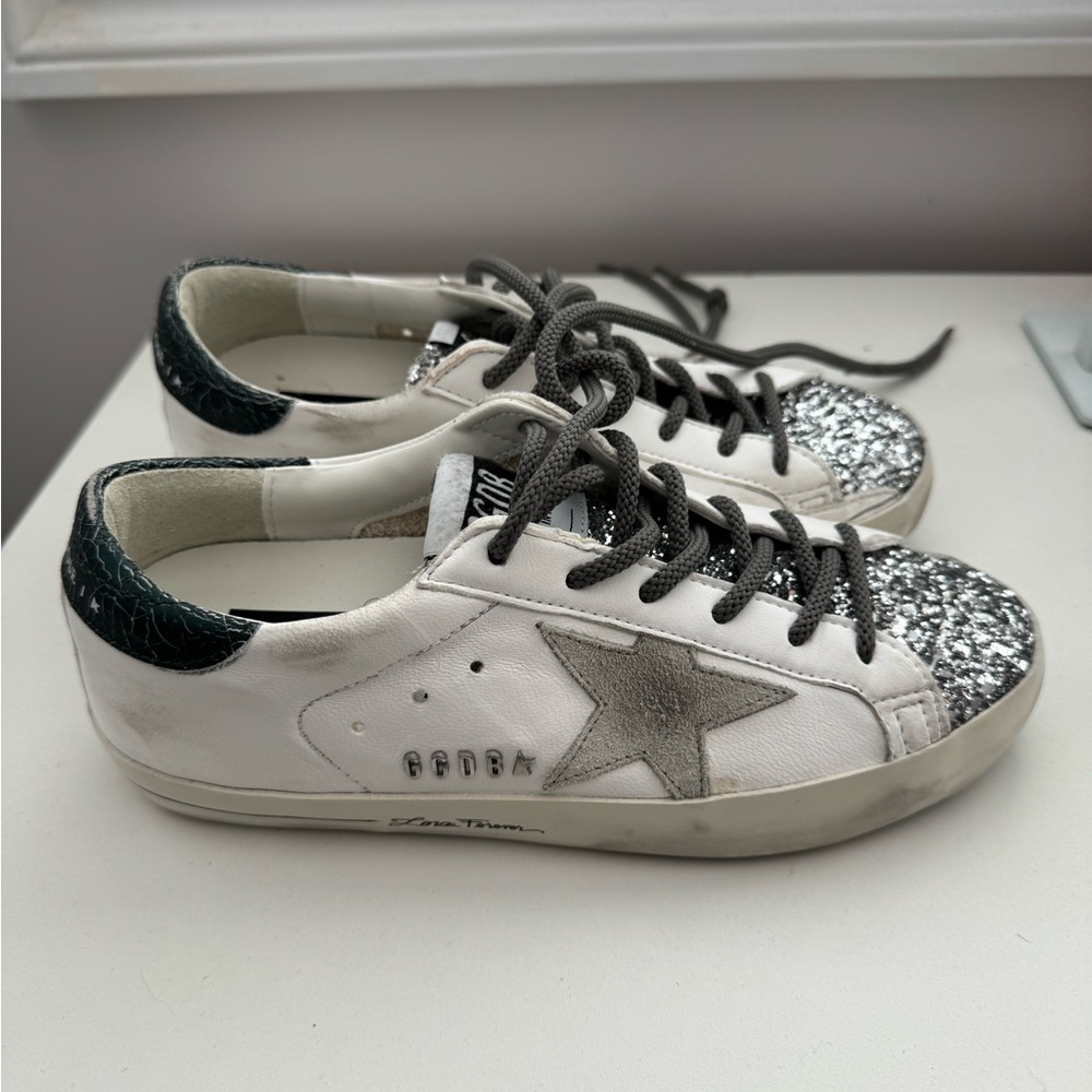 Never worn, ordered the wrong size. No box